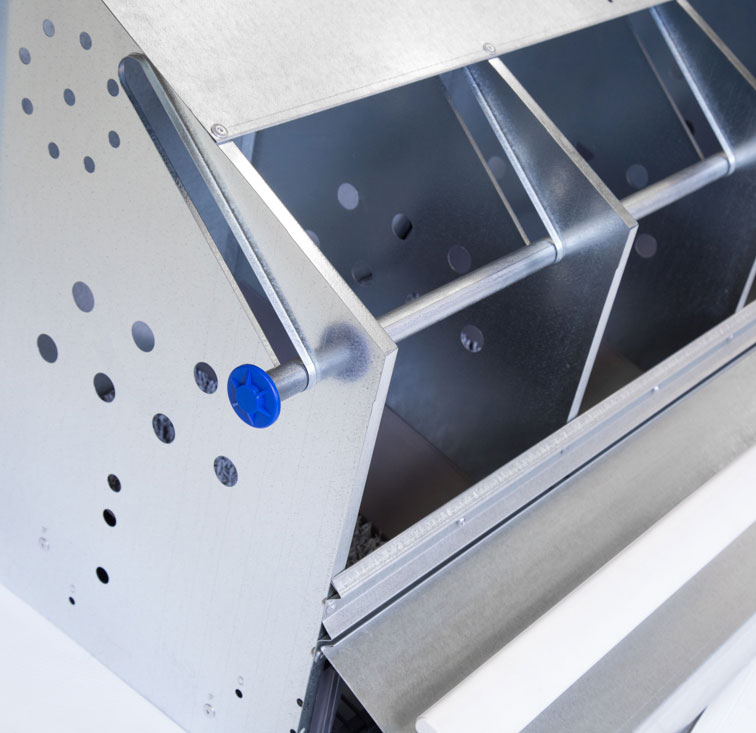 The automatic closure bar on GrowerSELECT chicken nests is raised and lowered by winching system. The white poly front perch and nest ventilation holes increase bird comfort and productivity.
